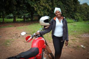 female agent with her motorbike